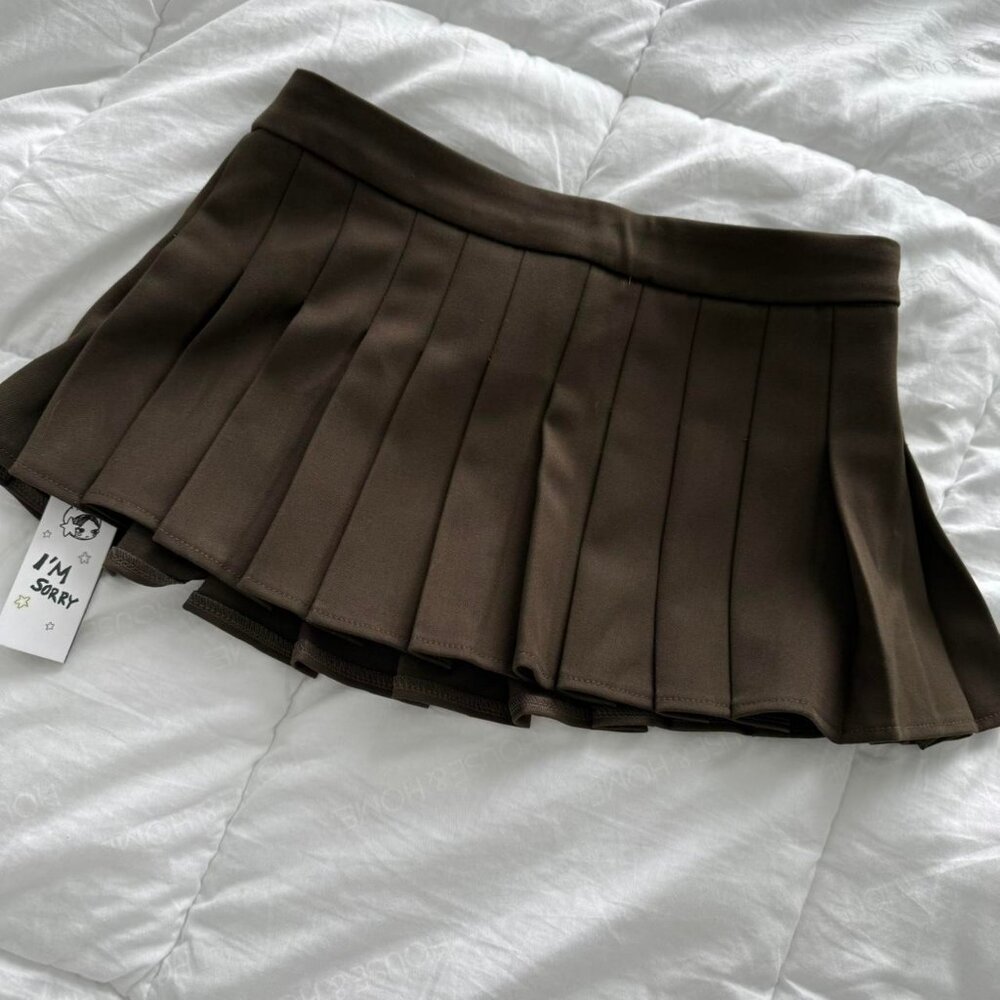 With Jean low rise dark olive mini skirt Size small Brand new